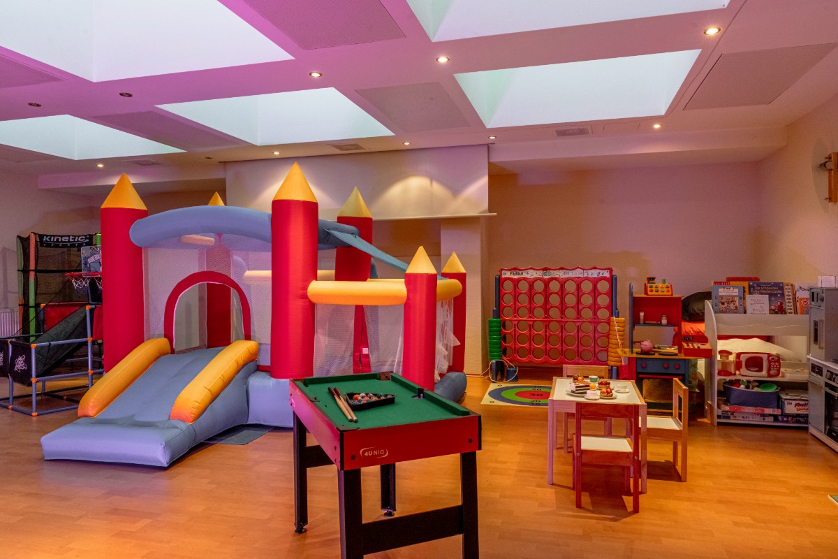 The children's club in the Arkona beach residences with bouncy castle, pool table and other children's games.