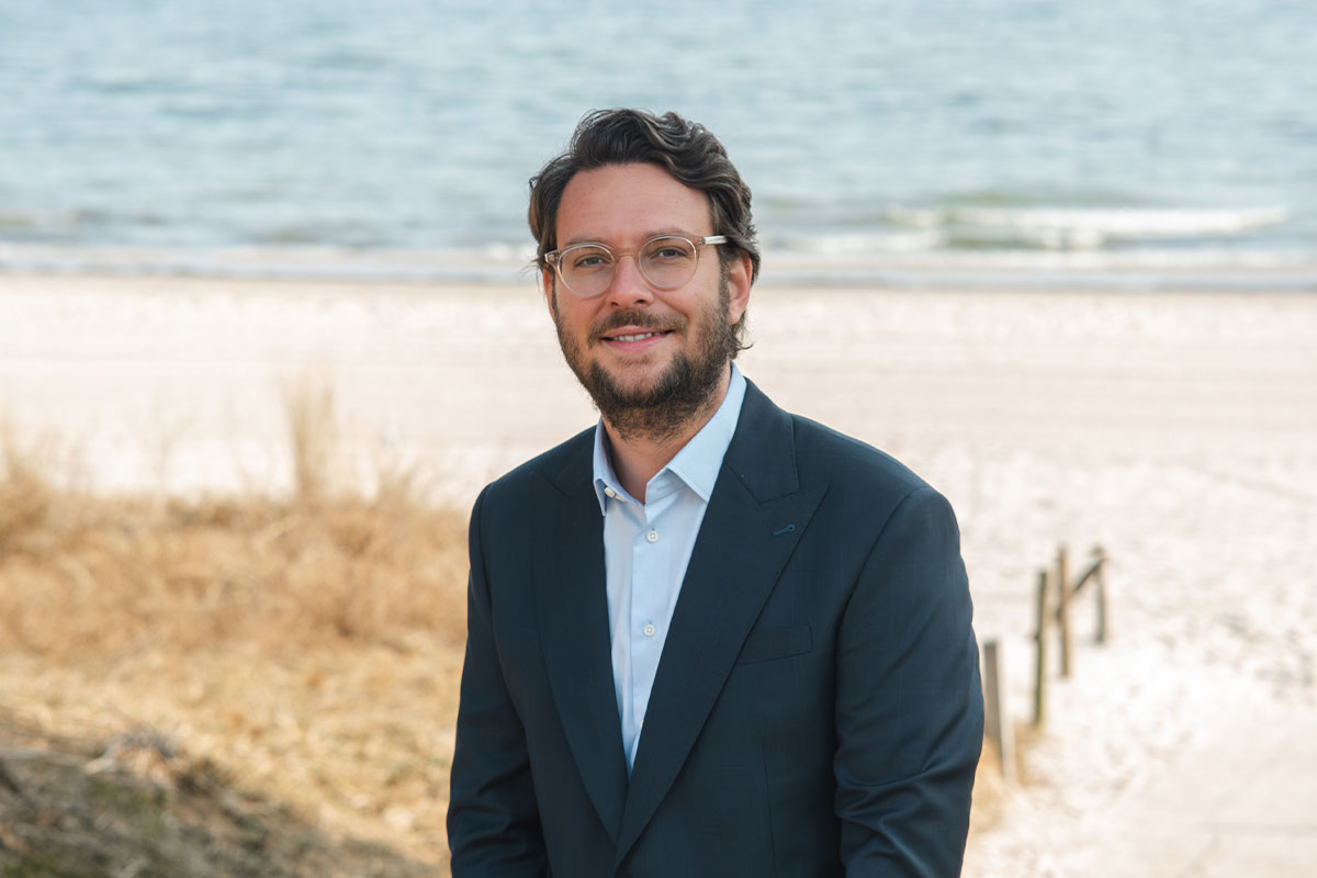 Hotel director Daniel Hutter on the beach near Arkona Strandresidenzen on Rügen